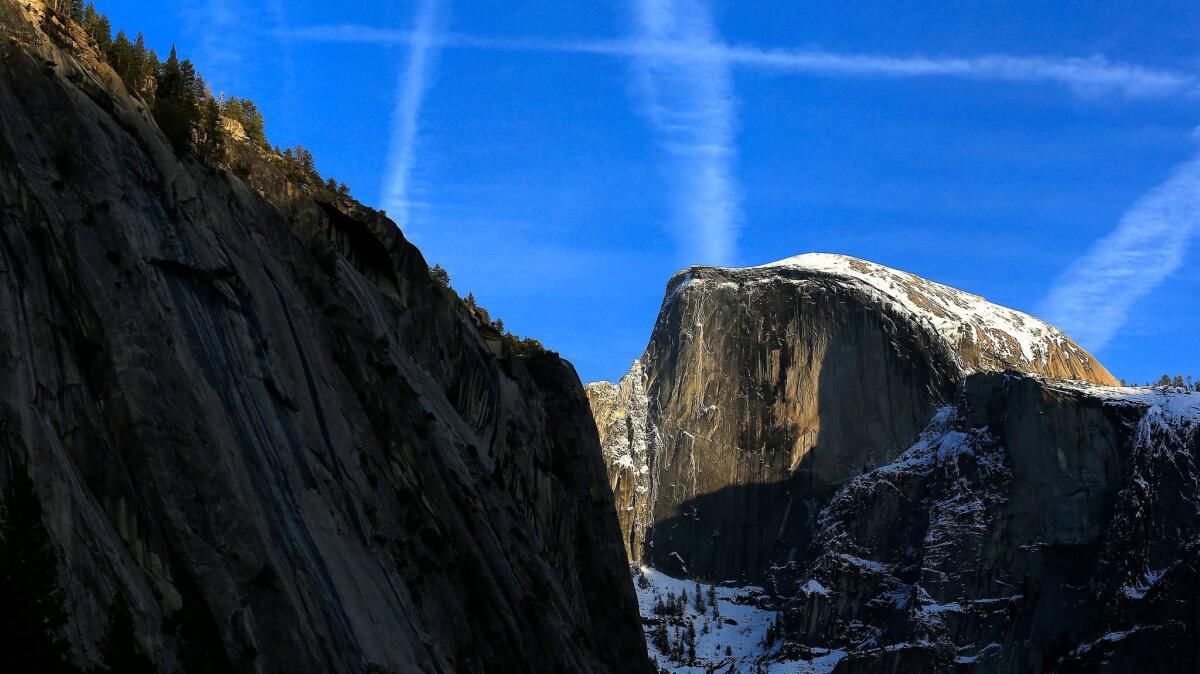 Dusted with snow, Half Dome has attracted climbers for decades.
