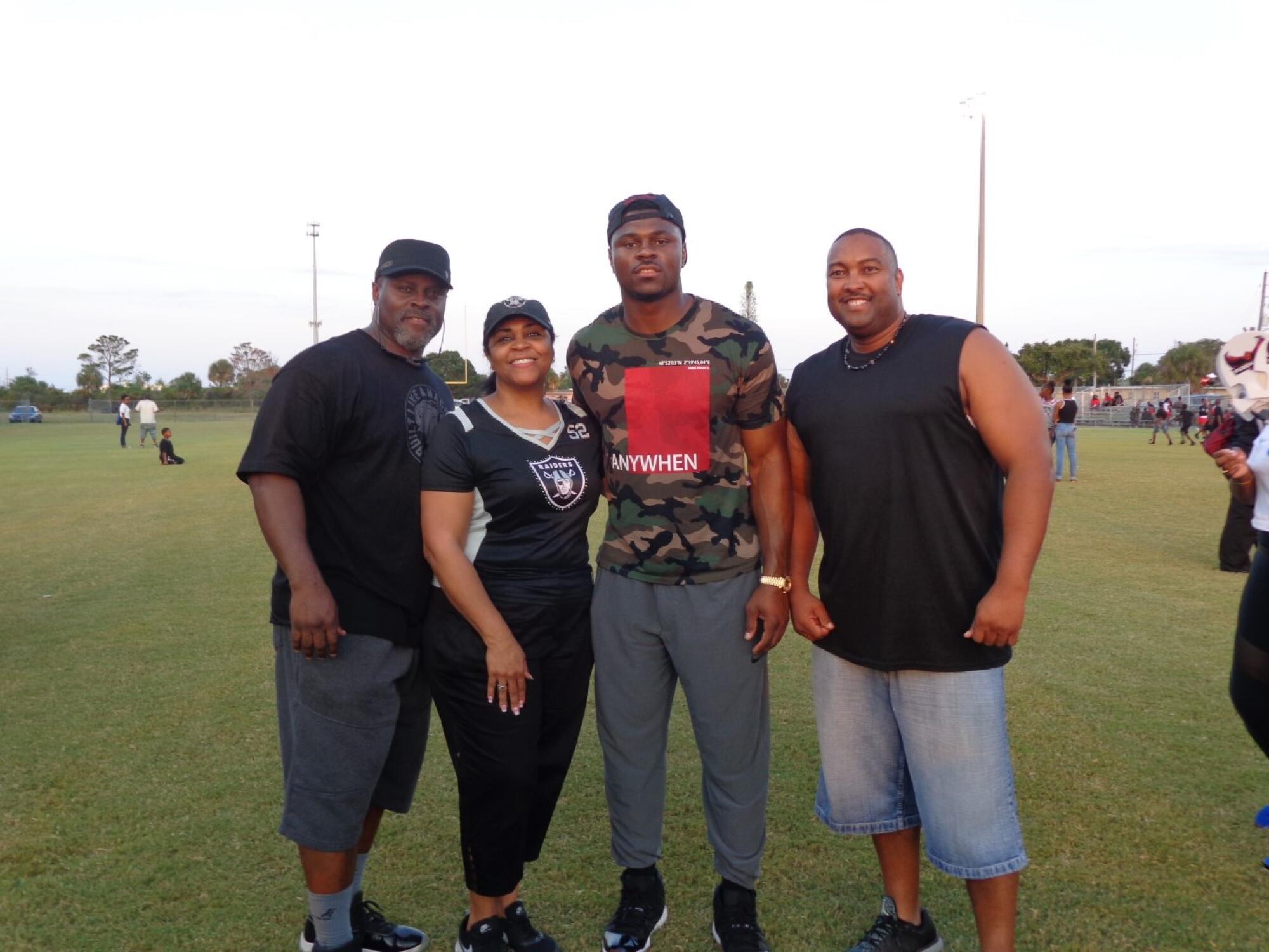 Sandy Mack, Yolanda, Khalil and Fort Pierce city manager Nick Mimms at the dedication of Khalil Mack Field.