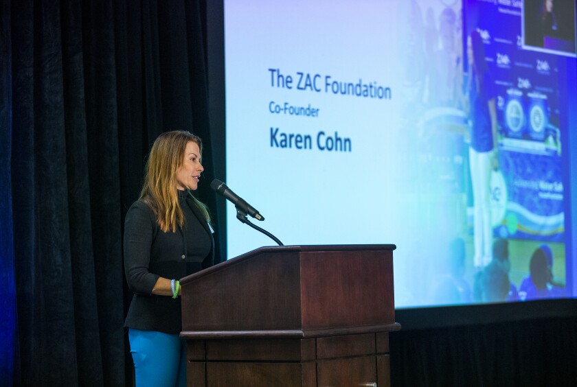 Karen Cohn, a co-founder of the ZAC Foundation, speaks.