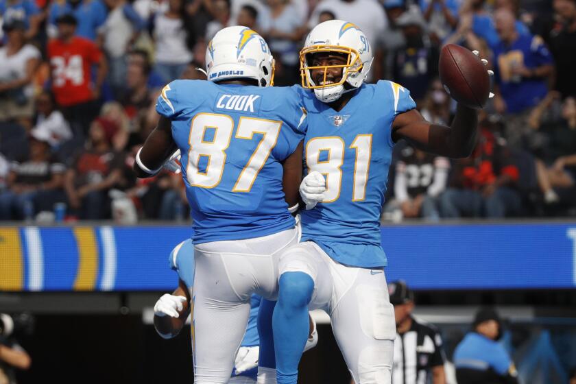 INGLEWOOD, CA - OCTOBER 10, 2021: Los Angeles Chargers wide receiver Mike Williams (81) celebrates.