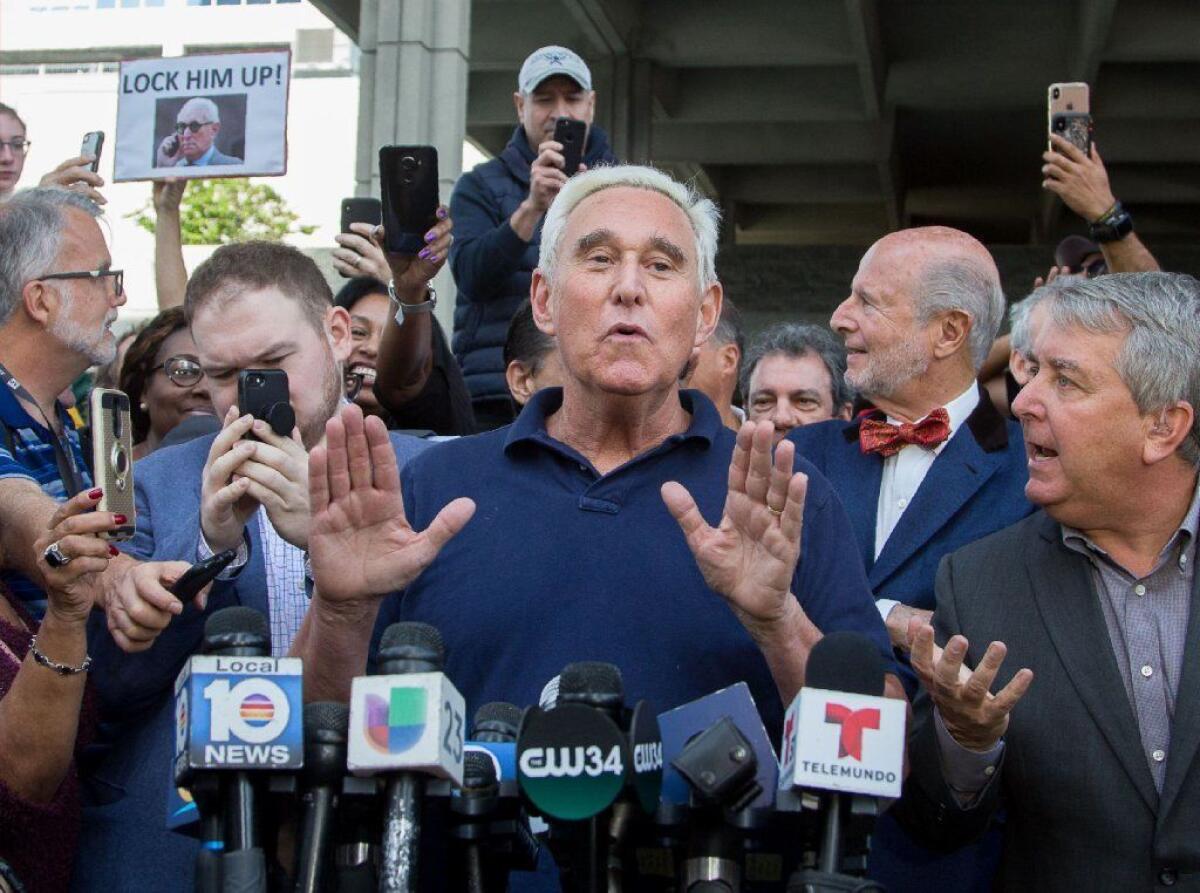 Roger Stone speaks to reporters outside federal court in Fort Lauderdale, Fla., on Friday after being released on a $250,000 bond.