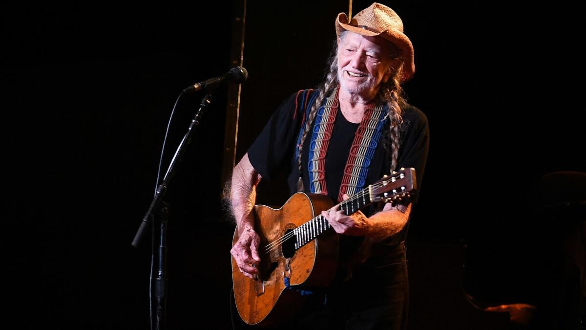 Willie Nelson, shown at the Shrine Auditorium in 2017, headlines the Outlaw Music Festival coming to the Hollywood Bowl on Oct. 21.