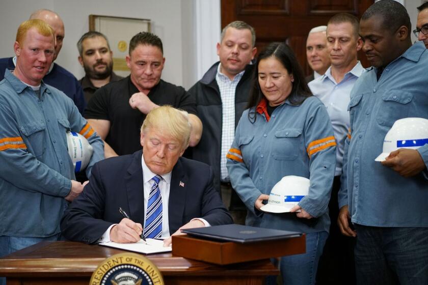 TOPSHOT - US President Donald Trump signs Section 232 Proclamations on Steel and Aluminum Imports in the Oval Office of the White House on March 8, 2018, in Washington, DC. Trump on Thursday declared the American steel and aluminum industries had been "ravaged by aggressive foreign trade practices" as he signed off on contentious trade tariffs. "It's really an assault on our country," he continued. "I've been talking about this a long time, a lot longer than my political career." / AFP PHOTO / MANDEL NGANMANDEL NGAN/AFP/Getty Images ** OUTS - ELSENT, FPG, CM - OUTS * NM, PH, VA if sourced by CT, LA or MoD **