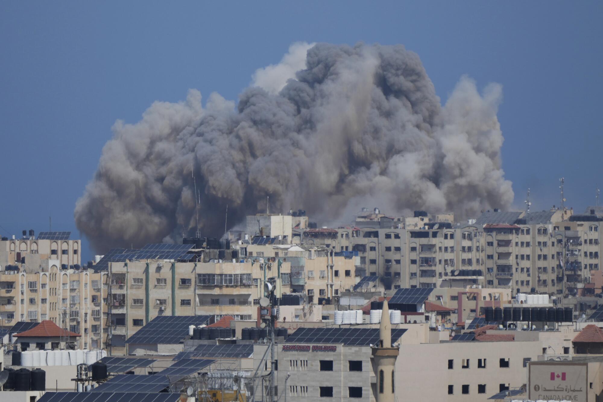 Smoke rising following an Israeli airstrike in Gaza City