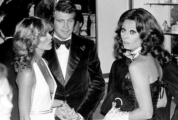 Farrah Fawcett-Majors, left, husband Lee Majors and Sophia Loren were among those attending a gala for the Prince of Wales in Beverly Hills in 1977.
