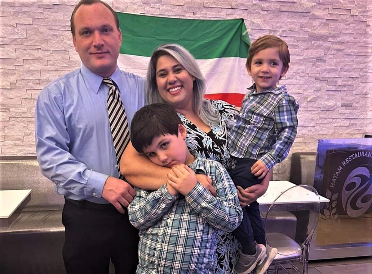 Henny Abraham with husband Brad and sons Arta, 8, and 3-year-old Allen.