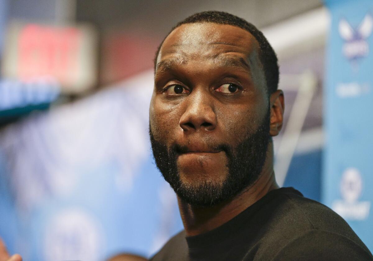 Hornets power forward Al Jefferson pauses as he speaks to the media after the NBA announced Jefferson has been suspended for violating the NBA/NBPA Anti-Drug Program.