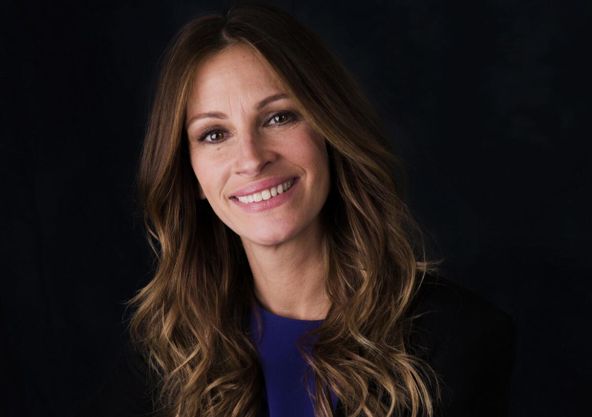 Actress Julia Roberts was named "World's Most Beautiful Woman' by People Magazine for the fifth time.