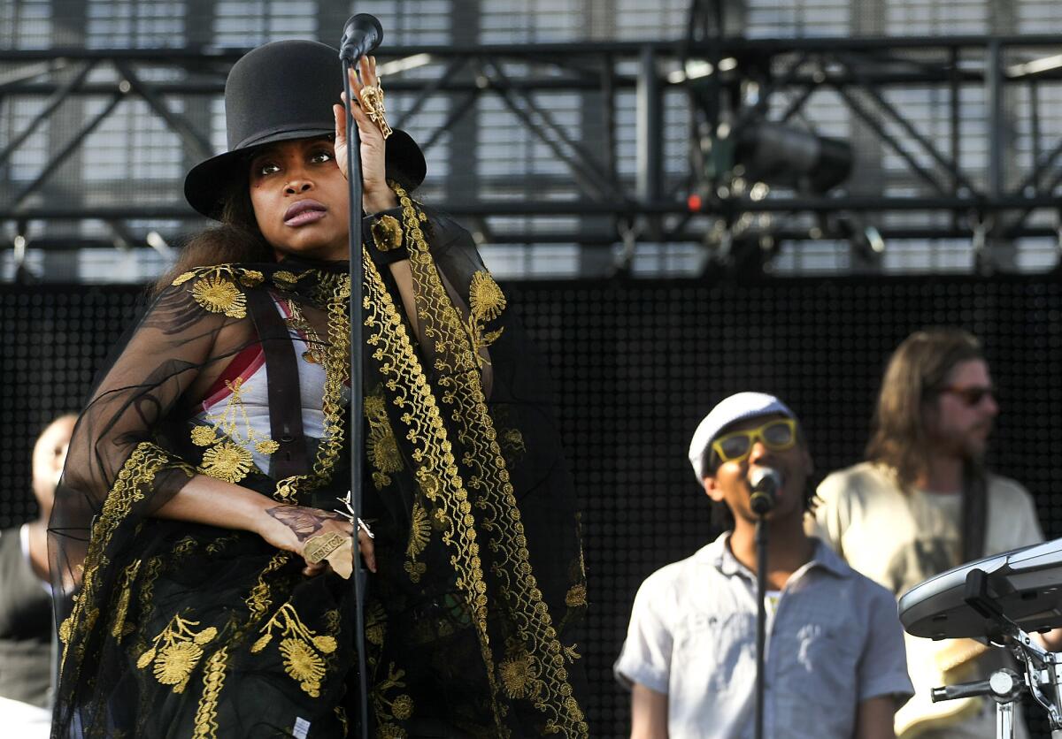 Erykah Badu performs on the Coachella stage at the Coachella Valley Music and Arts Festival at the Empire Polo Grounds in Indio April 16 2011. Badu will headline the first Soulquarius Festival. Billed as an R&B jam it will be held Feb. 18 at the Observatory Grounds in Santa Ana.