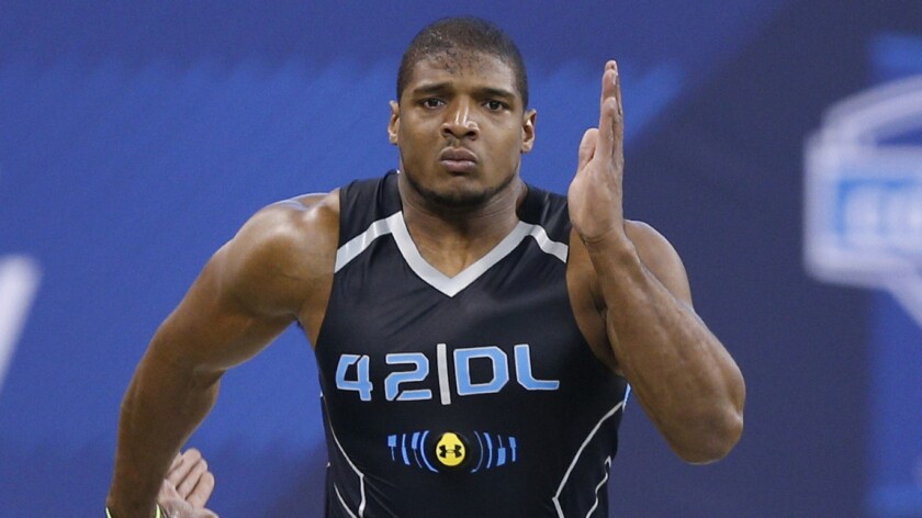 Former Missouri defensive end Michael Sam, who was drafted by the St. Louis Rams on Saturday, has the second-most-popular jersey of the 2014 draft class. Above, Sam runs the 40-yard dash in February.