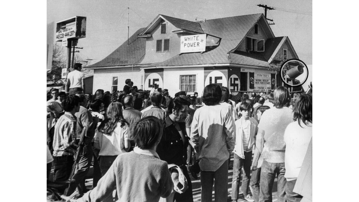 Jan. 30, 1972: Anti-Nazi protesters gather outside the National Socialist White People's Party headquarters in El Monte. During the protest, eggs, bottles and a wastebasket, shown circled in the above photograph, were thrown.