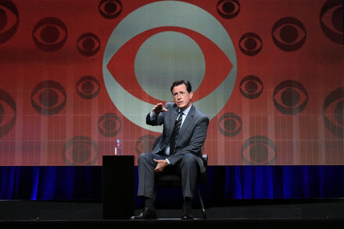 Stephen Colbert participates in "The Late Show with Stephen Colbert" segment of the CBS Summer TCA Tour at the Beverly Hilton Hotel on Monday, Aug. 10, 2015, in Beverly Hills, Calif. (Photo by Richard Shotwell/Invision/AP)