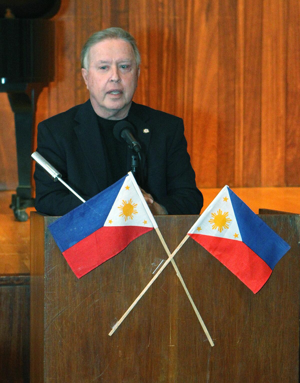 Mayor Dave Weaver addressing the crowd at a celebration of Philippine Heritage - Arts and Culture at the Glendale Library on Friday, October 11, 2013.