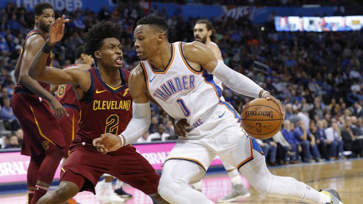 Oklahoma City Thunder guard Russell Westbrook (0) drives to the basket against Cleveland Cavaliers guard Collin Sexton (2) during the second half.