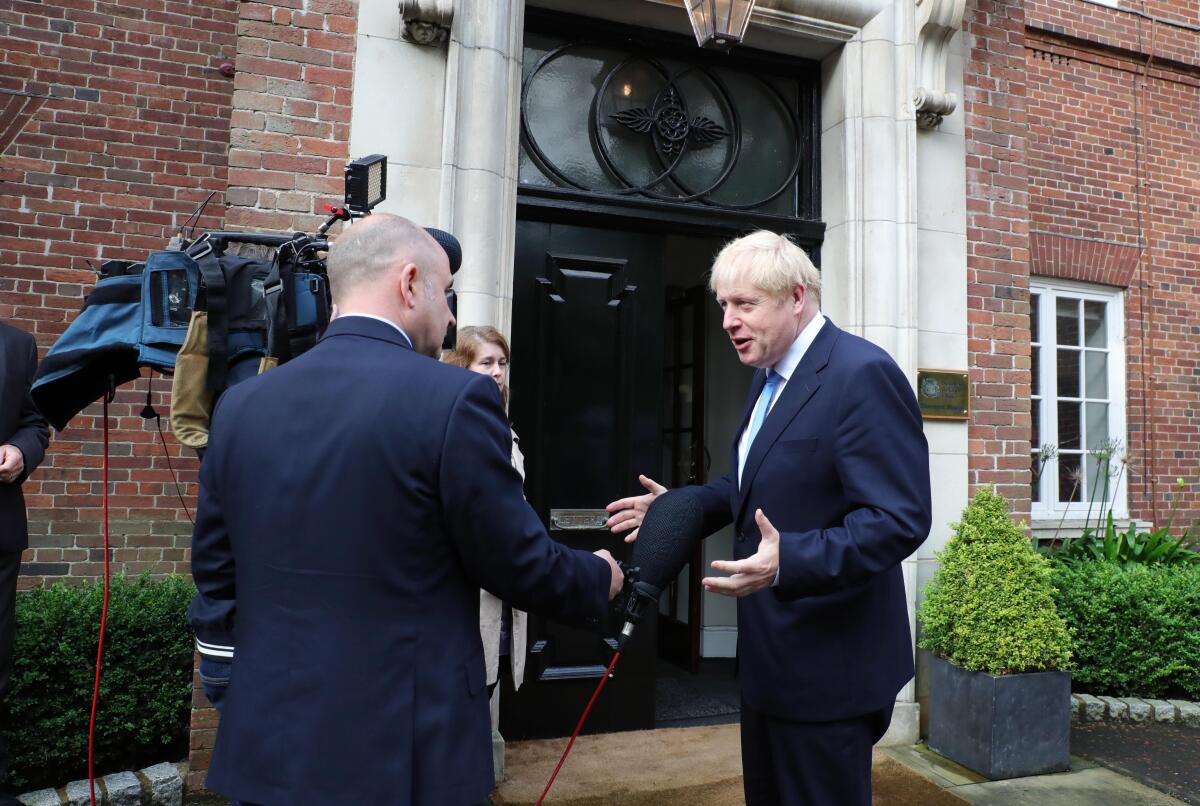 British Prime Minister Boris Johnson arrives at Stormont House in Belfast, Northern Ireland, on July 31, 2019.