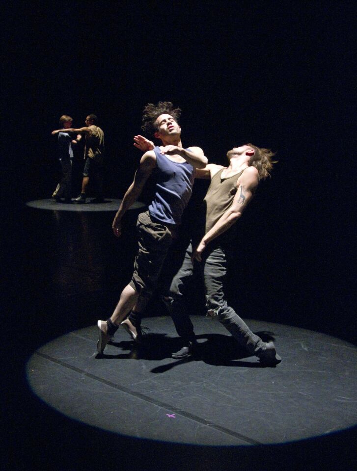 Felix Cruz, front left, and Joey Cannizzano in a scene during a dress rehearsal of the production of "Them" at REDCAT. The performance was a restaging of what was in 1986 an incendiary work of dance theater during the escalating AIDS crisis. REVIEW: Desire and sexual politics whirl among 'Them'