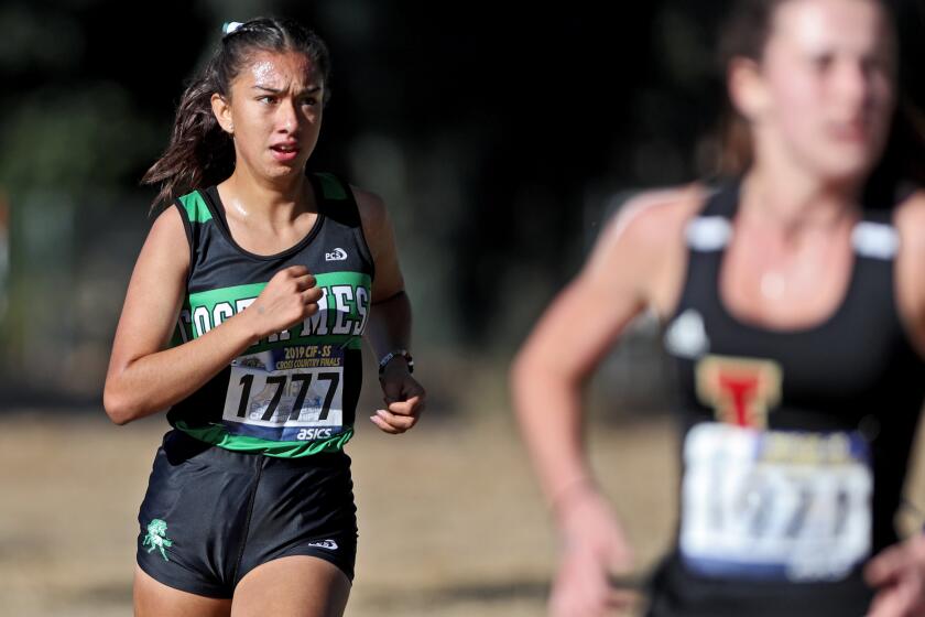 Coasta Mesa senior Diane Molina finished fourth in the girls division 4 CIF Southern Section Cross Country Finals, at Riverside City Cross-Country Course in Riverside on Saturday, Nov. 23, 2019.