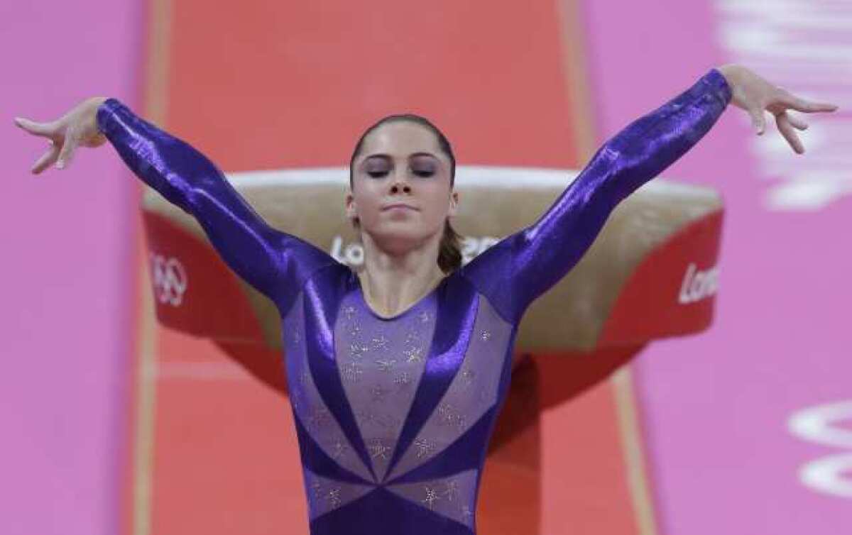 McKayla Maroney competes on the vault.