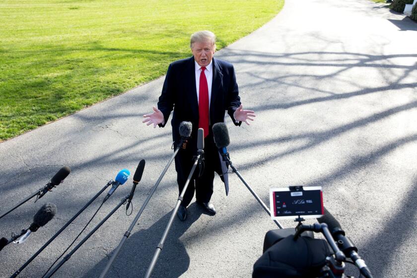 Mandatory Credit: Photo by MICHAEL REYNOLDS/EPA-EFE/REX (10181037g) US President Donald J. Trump responds to questions from members of the news media, on the South Lawn of the White House before departing by Marine One, in Washington, DC, USA, 28 March 2019. Trump travels to Grand Rapids, Michigan, to hold his first rally since Special Counsel Robert Mueller concluded his report on the investigation into Russian interference in the 2016 election. US President Donald J. Trump, Washington, USA - 28 Mar 2019 ** Usable by LA, CT and MoD ONLY **