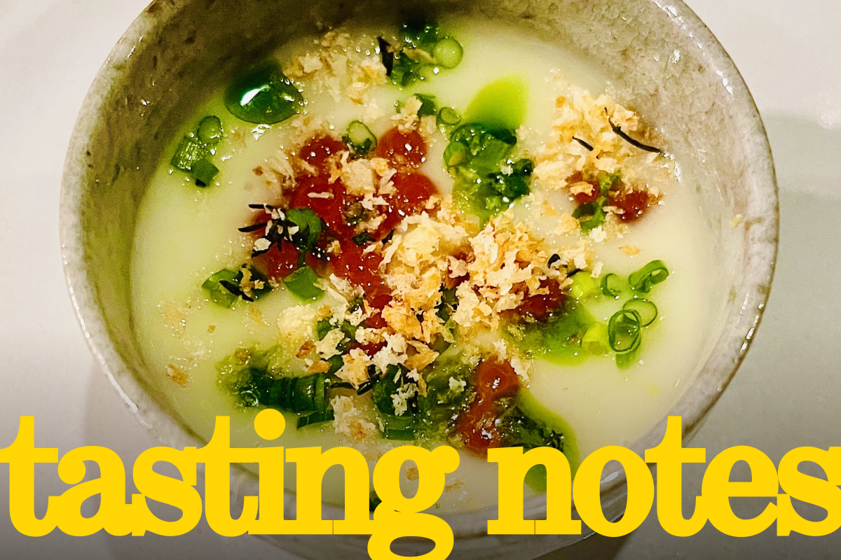 A bowl of vichyssoise with dashi ikura, chive oil and "herb popcorn"