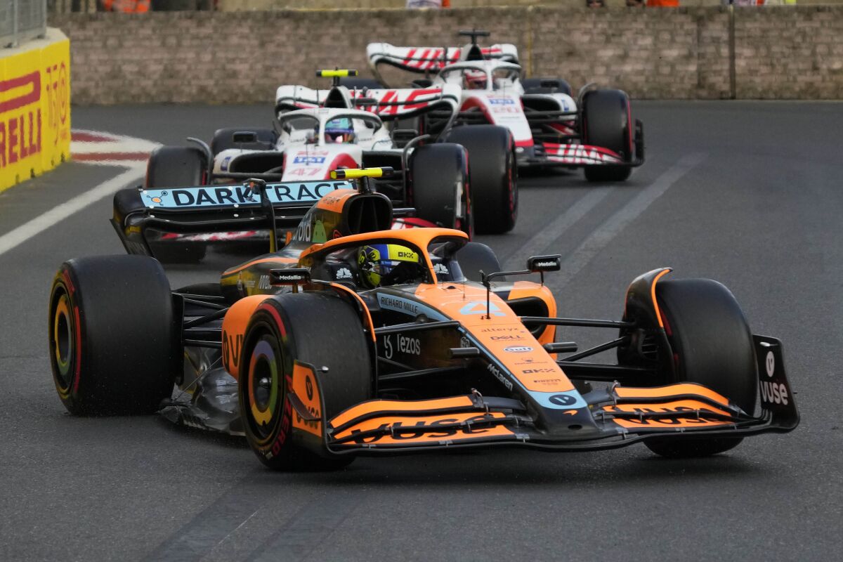 Mclaren driver Lando Norris of Britain steers his car during the qualifying session at the Baku circuit, in Baku, Azerbaijan, Saturday, June 11, 2022. The Formula One Grand Prix will be held on Sunday. (AP Photo/Sergei Grits)