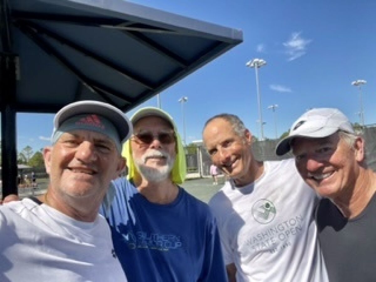 Dr. Brendan Gaylis, left, won an age-division doubles title last month at the World Medical Tennis Society's annual event.
