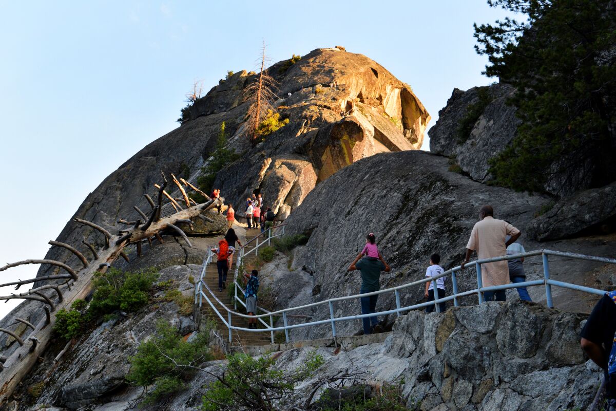 Visitors climb to Moro Rock in Sequoia National Park.