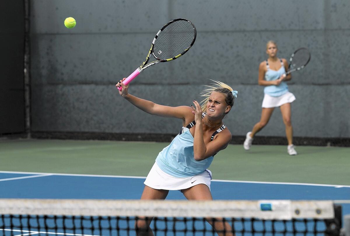 Siena Sharf and the Corona del Mar High girls' tennis team play at University in a key Pacific Coast League match on Thursday.