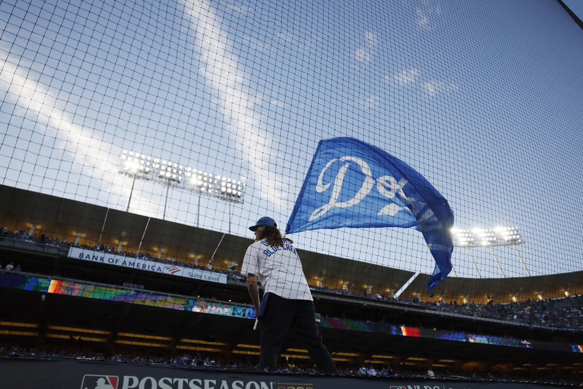 Fans get ready for the second National League Division Series game at Dodger Stadium. 
