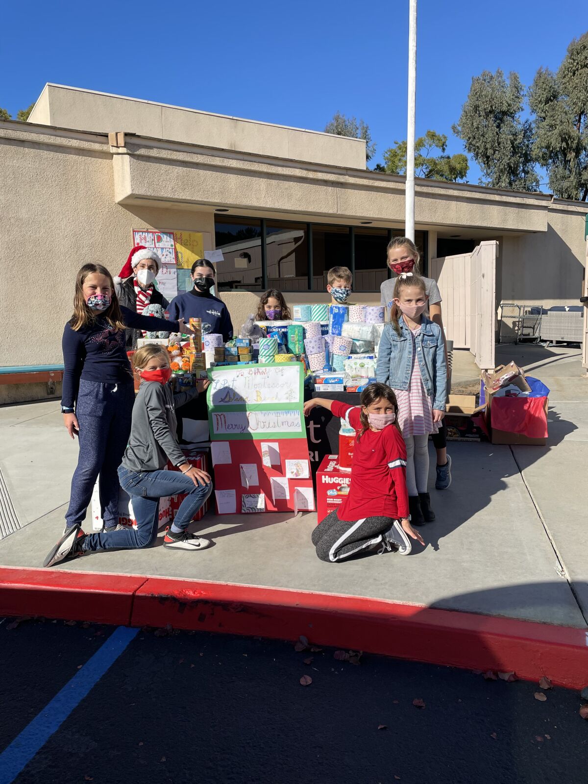 Students held a donation drive for Our Lady of Guadalupe Church in Barrio Logan.