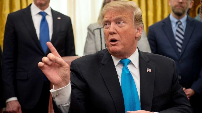 President Trump, speaking to reporters at the White House on Feb. 19, signed a directive on his proposed "space force."