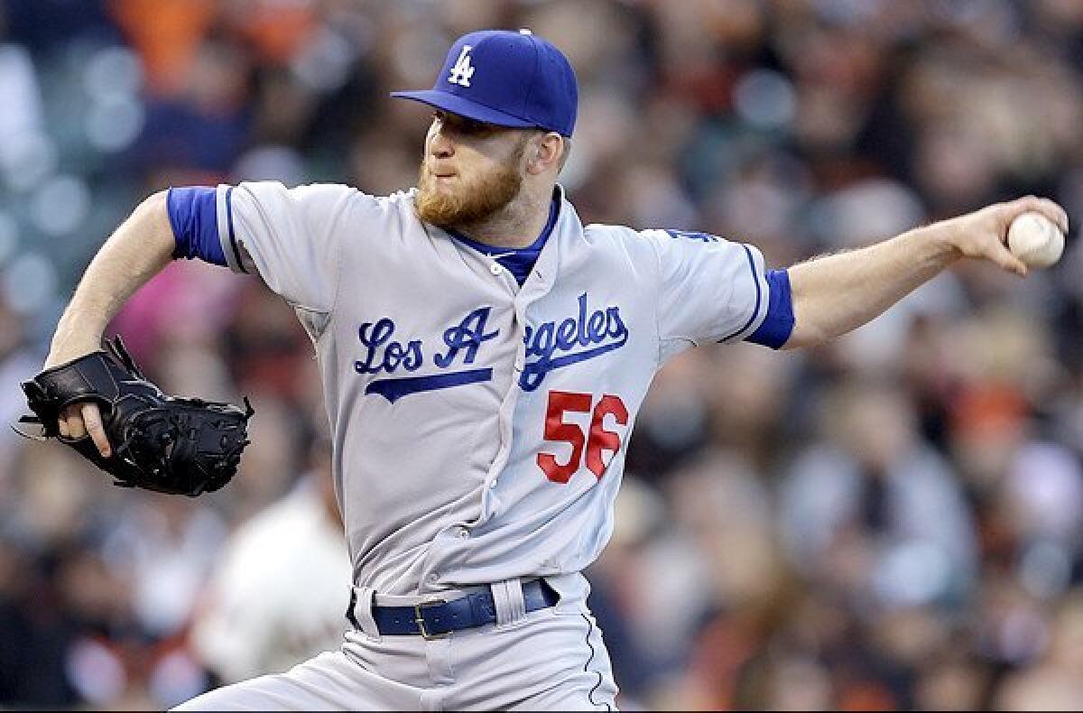 Dodgers reliever J.P. Howell delivers a pitch against the Giants last month in San Francisco. He described his role in Tuesday's brawl between the Dodgers and Diamondbacks.