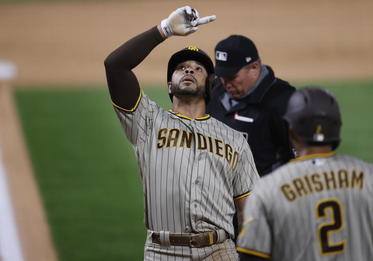 Padres use Phamtastic finish to defeat Rockies in wild game - The