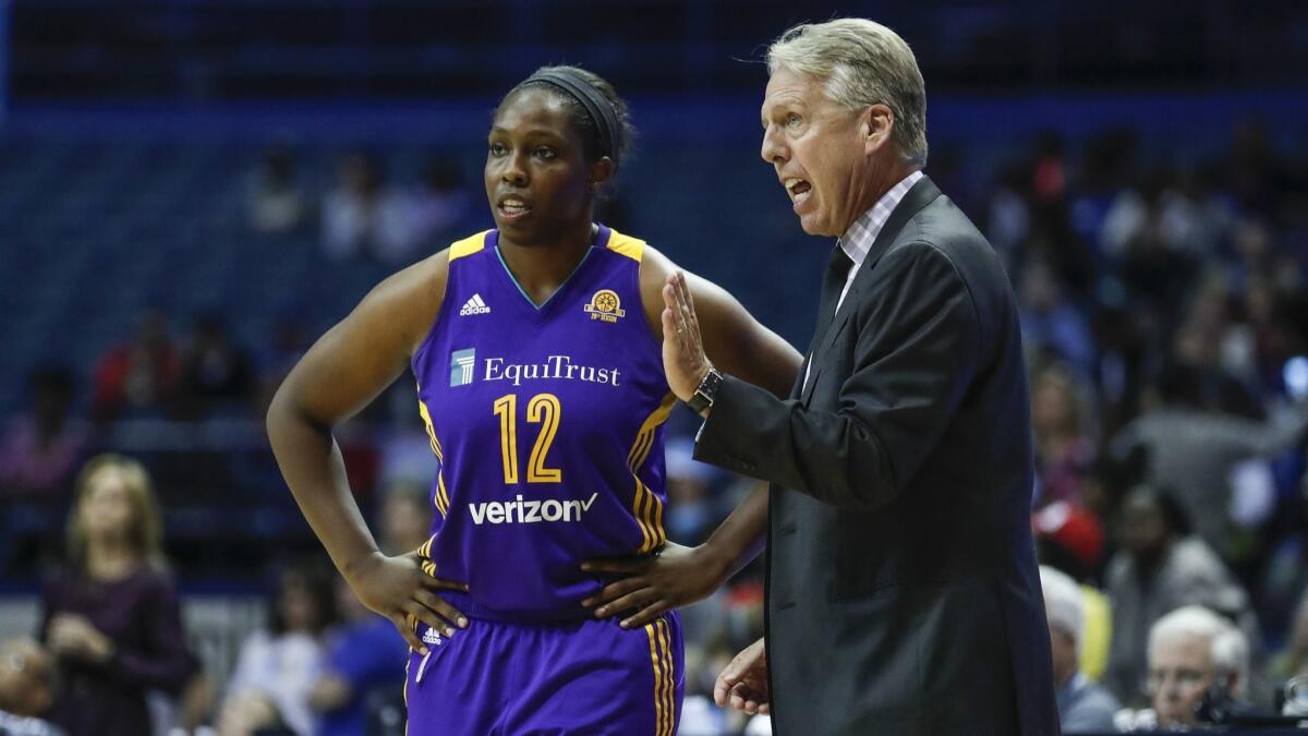 The Sparks' Chelsea Gray, shown with coach Brian Agler. Gray plays overseas during the WNBA offseason.