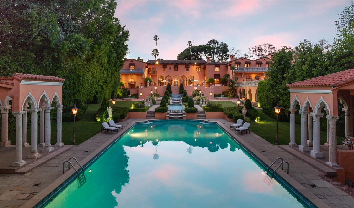 A pool and a mansion.