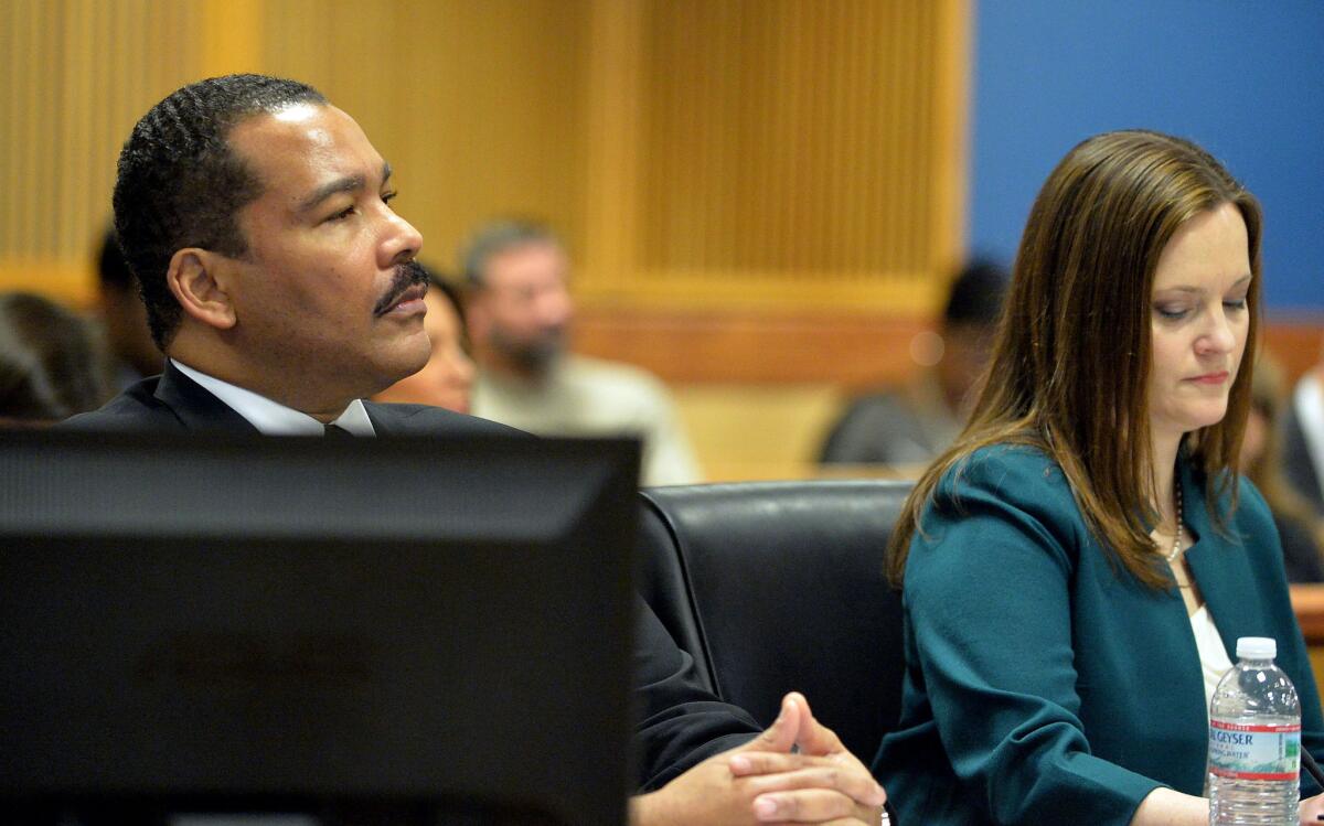 Dexter Scott King and attorney Nicole Wade at Tuesday's hearing in Fulton County Superior Court in Atlanta.