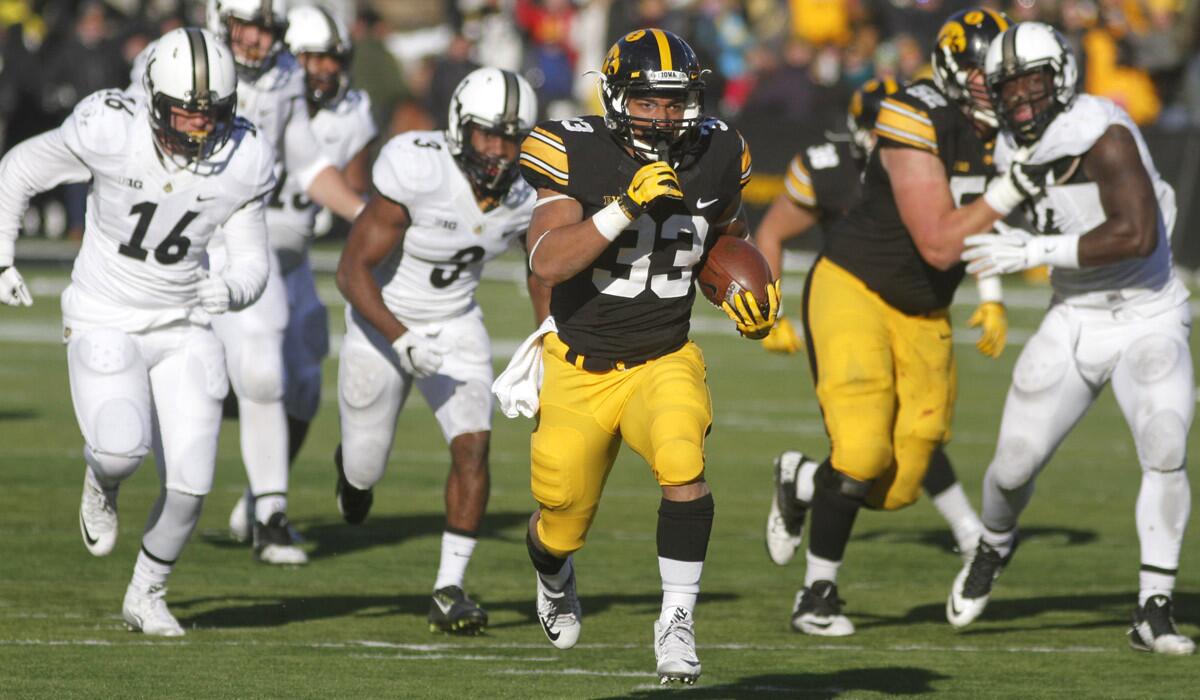 Iowa running back Jordan Canzeri breaks away for a touchdown in the second half against Purdue last Saturday.