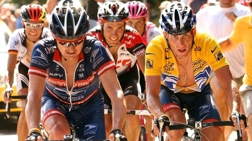 Floyd Landis (left) and Lance Armstrong in a file photo from the 2004 Tour de France.