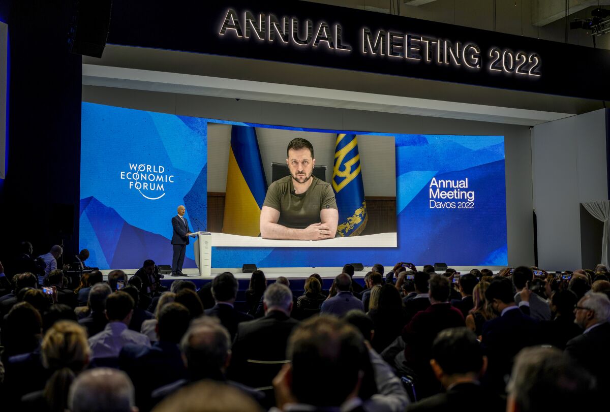 Ukrainian President Volodymyr Zelensky on a screen during virtual address