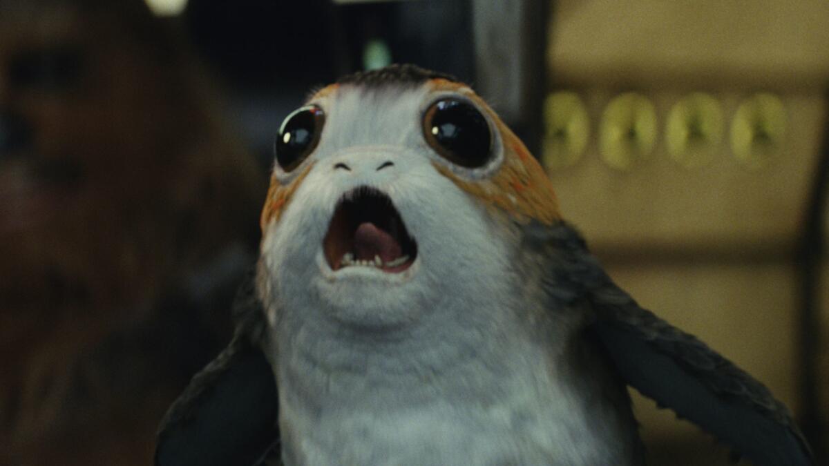 (L-R) - Chewbacca with a Porg in a scene from the movie "Star Wars: The Last Jedi." Credit: Lucasfilm Ltd.