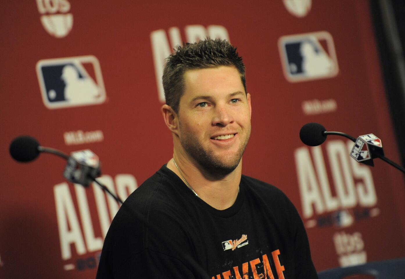 Bud Norris talks at the postgame press conference.