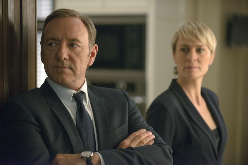 Kevin Spacey as Francis Underwood, left, and Robin Wright as Clair Underwood in a scene from Netflix's original drama "House of Cards."