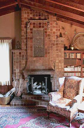 HOMEY ELEGANCE: Ernest Batchelder had a timeless style, as seen in the homey elegance of the fireplace with its earthy, understated tile work.