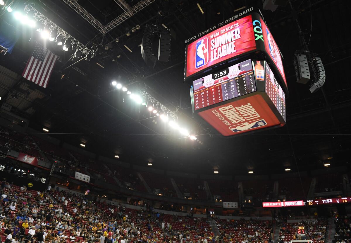 Some fans head for the exits after an earthquake shook the Thomas & Mack Center during a game between the New Orleans Pelicans and the New York Knicks during the NBA Summer League on Friday in Las Vegas.