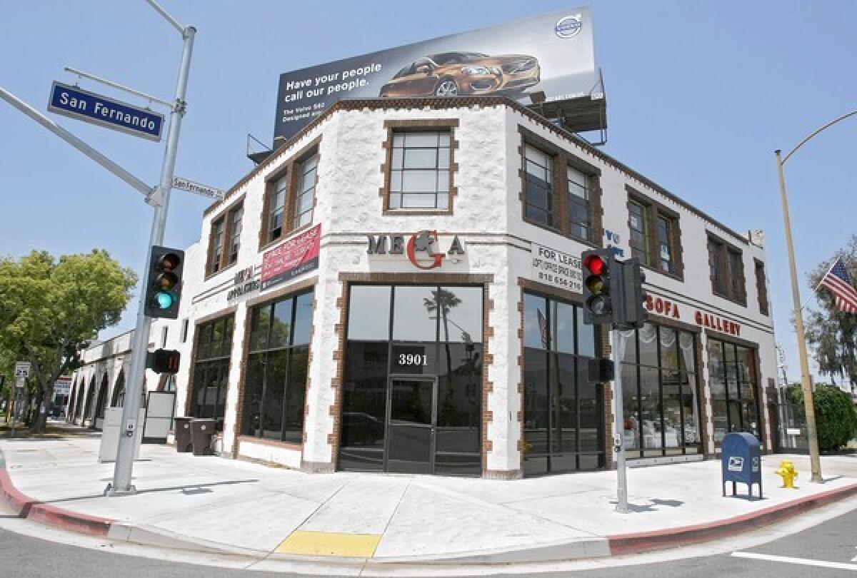 The building at 3901 San Fernando Rd. in Glendale houses several businesses, including 20-plus year tenant Solar Studios. The Glendale Historical Society has bolstered its efforts to prevent the demolition the building with a report about its historic qualities, but a report commissioned by the property owner contests the society¿s findings.
