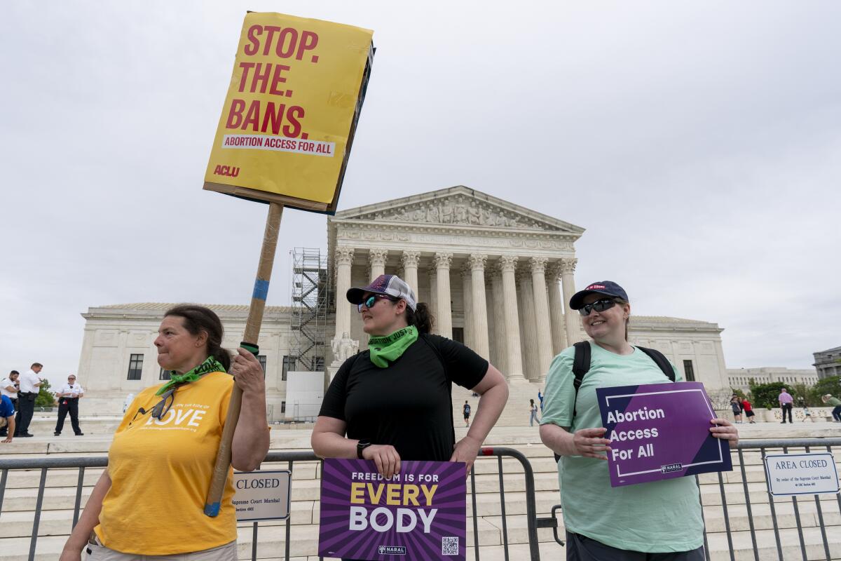Supporters of abortion rights demonstrate in front of the U.S. Supreme Court in Washington on April 14. 