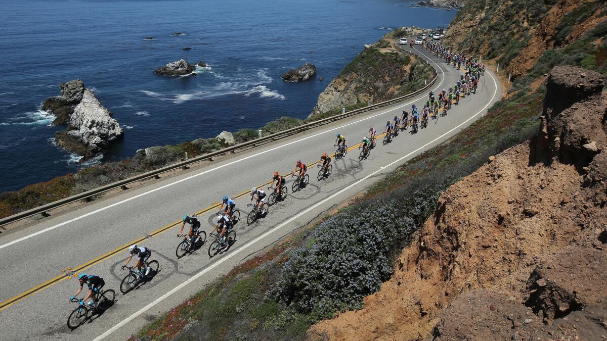 The peloton races alongside the Pacific Ocean south of Monterey during Stage 4 of the 2014 Amgen Tour of California.