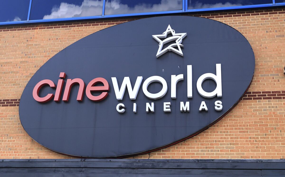 FILE - This June 18, 2020 file photo shows the logo of a Cineworld cinema in Northampton, England. U.K. media say cinema chain Cineworld will close all its U.K. venues after the postponement of the new James Bond film left a big hole in theaters’ schedules. The Sunday Times reported on Sunday, Oct, 4 that Cineworld’s 128 theaters in the U.K. and Ireland will shut in the coming weeks, putting up to 5,500 people out of work. (Mike Egerton/PA via AP, file)