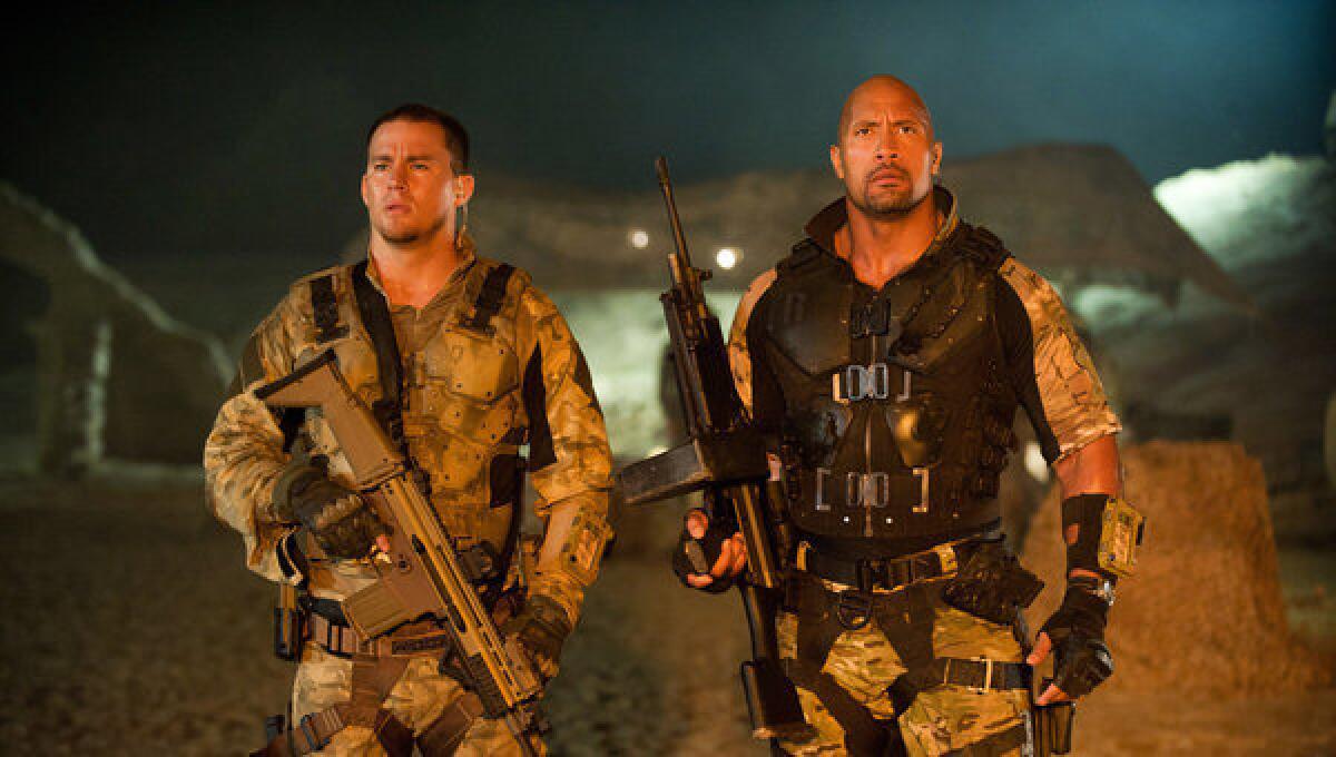 Channing Tatum, left, and Dwayne Johnson are shown in a scene from "G.I. Joe: Retaliation."