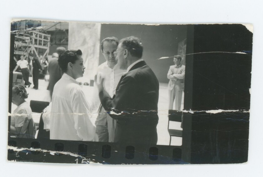 Garland, left, with Luft and director George Cukor on the set of “A Star Is Born.”